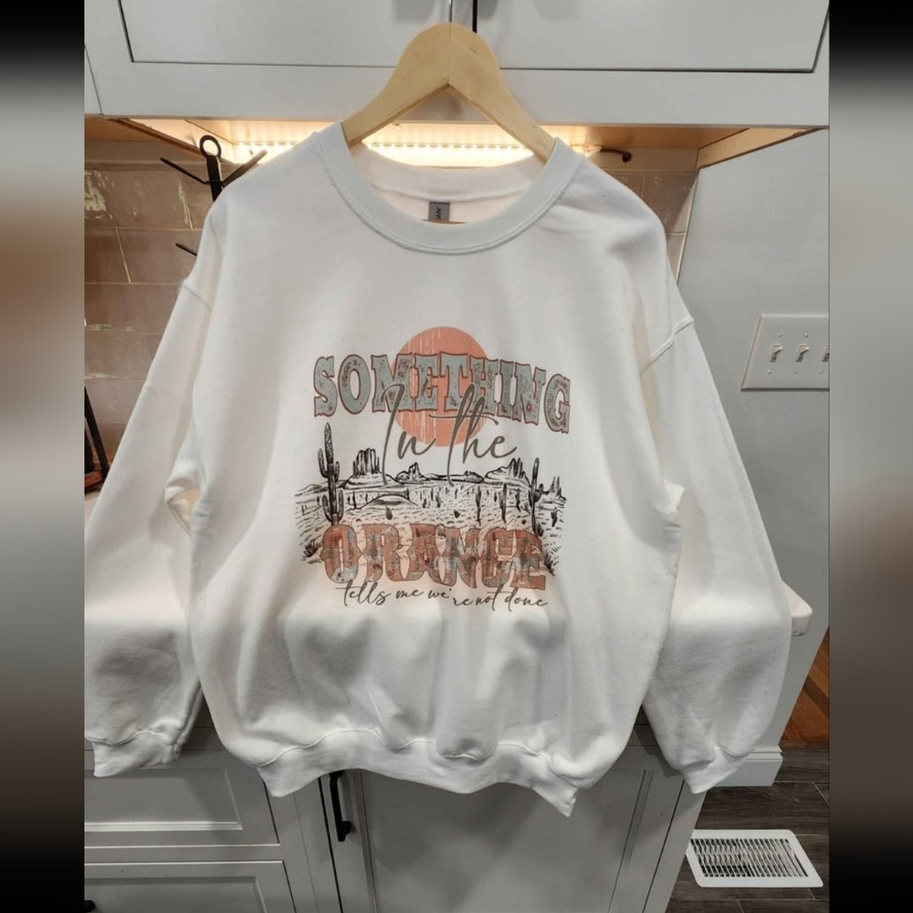White Graphic Sweatshirt with Orange and Gray Design